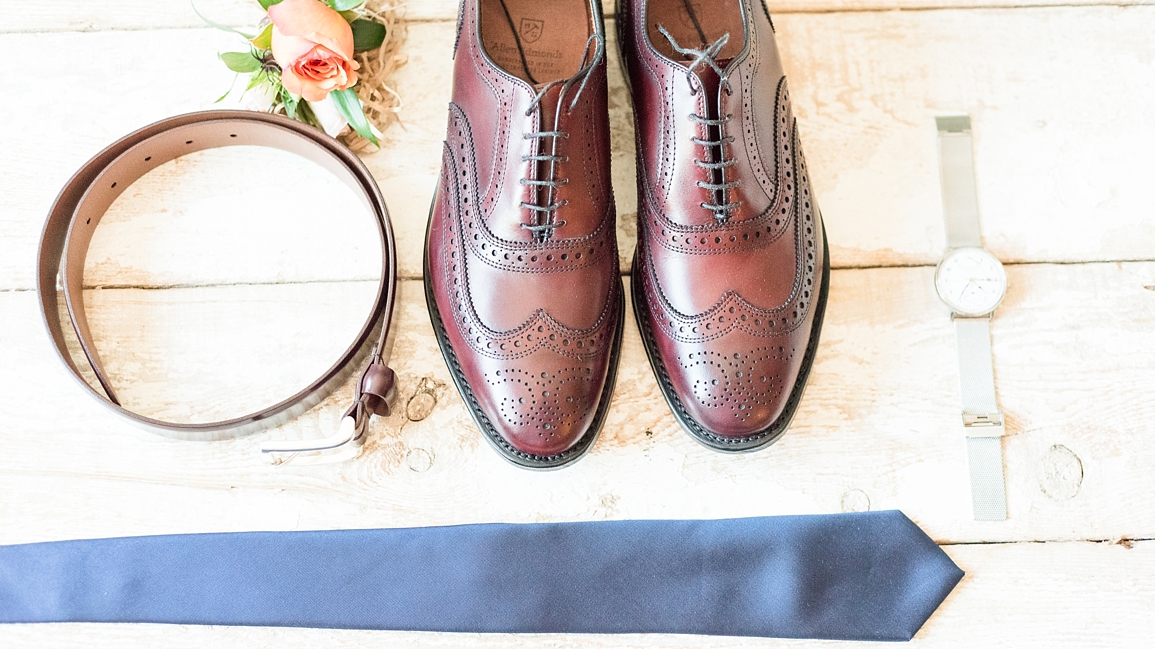 Brown leather shoes navy blue tie