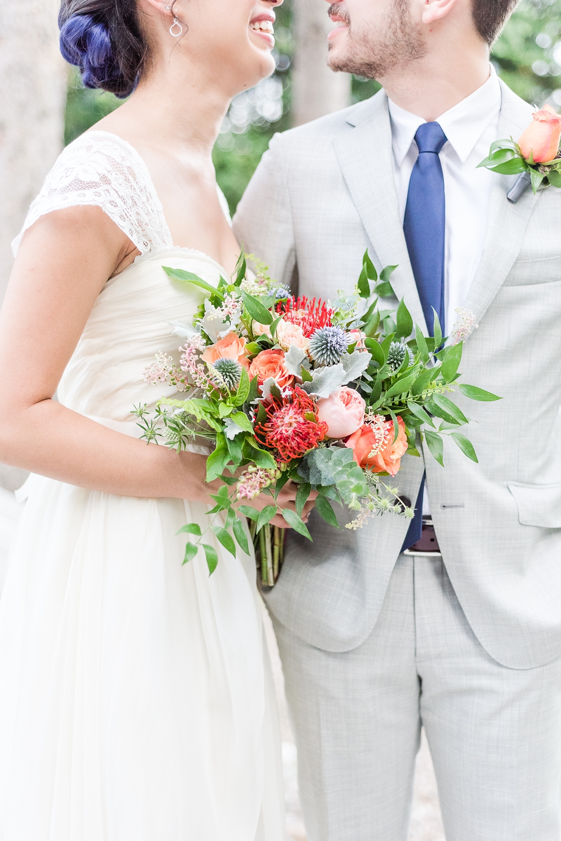 Bride and groom portraits with bloomfields flowers